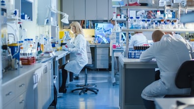 Scientist pipetting in a laboratory